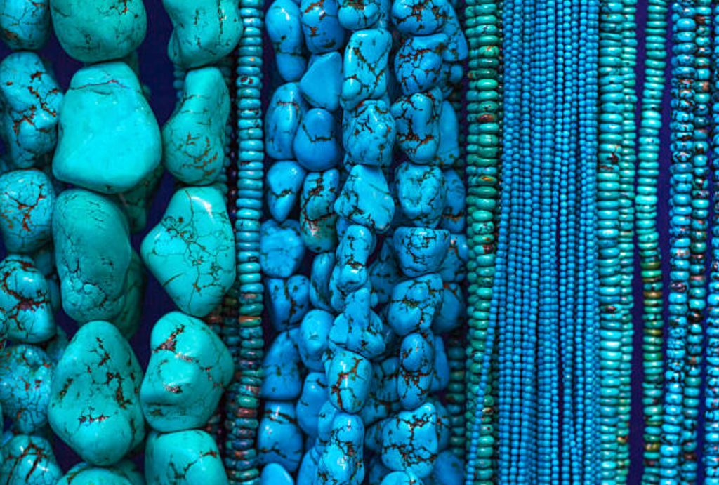 Turquoise crystal with vibrant blue-green hues, known for protection, emotional balance, and spiritual growth.