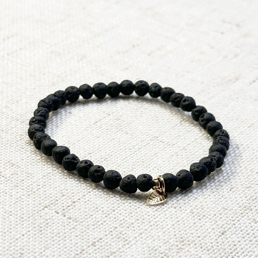 4mm lava stone energy bracelet with golden leaf charm for emotional balance