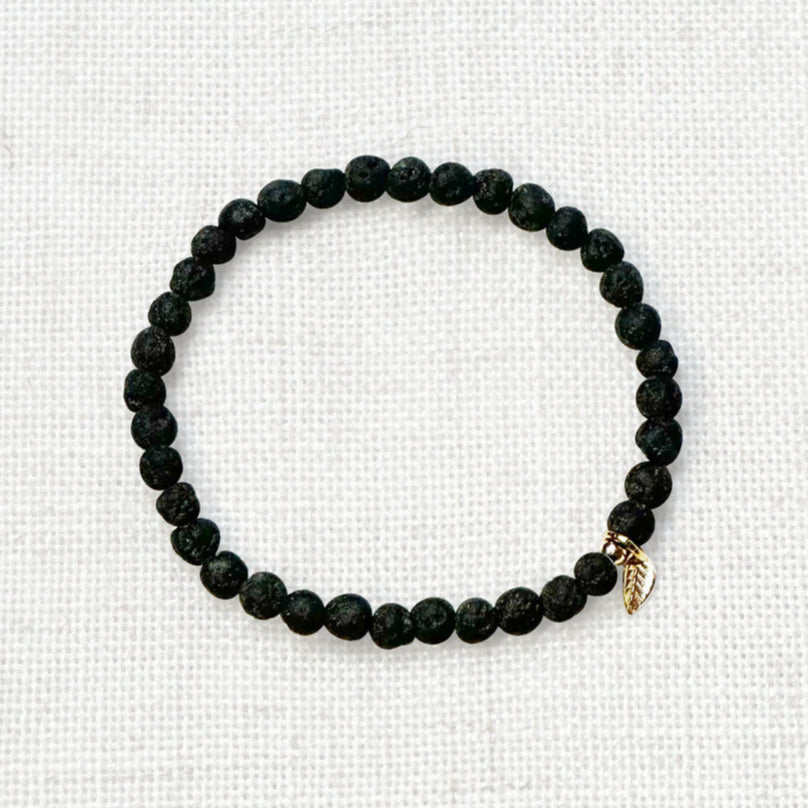 Handcrafted lava stone crystal bracelet for root chakra and stress relief