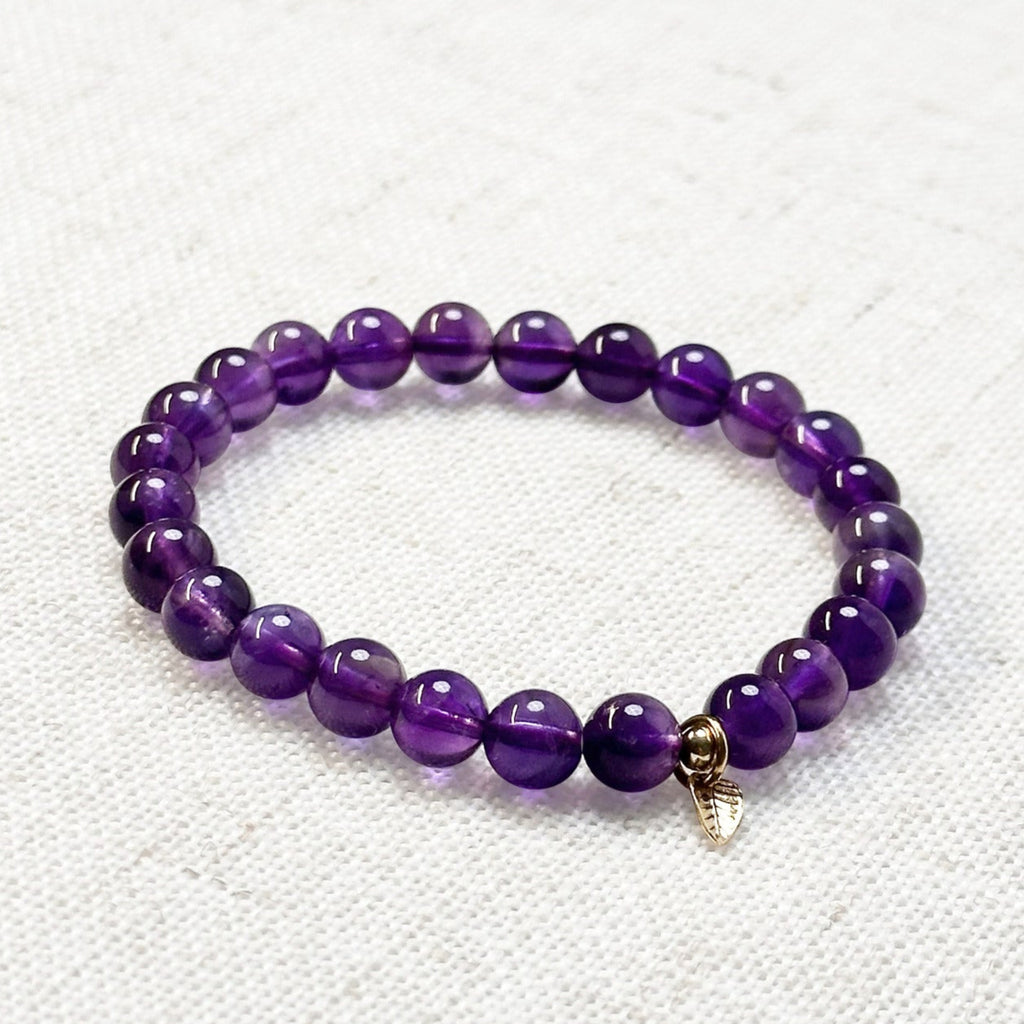 6mm Amethyst beaded bracelet with calming energy and elegant design