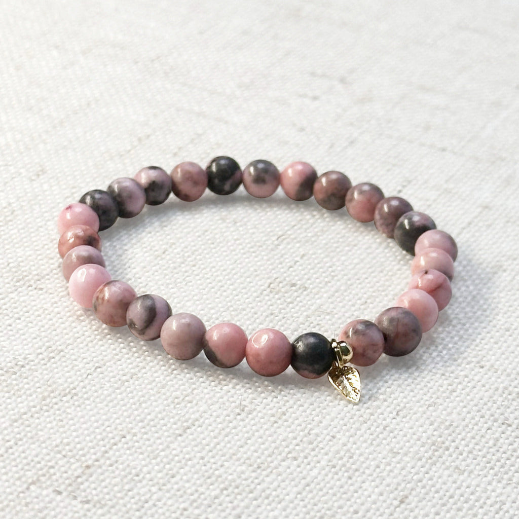 6mm pink zebra jasper bracelet with golden leaf charm