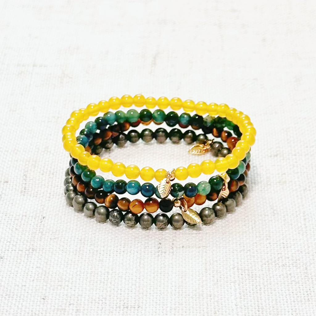 Abundance & Prosperity bracelet set with Moss Agate, Yellow Carneol, Tiger’s Eye, and Pyrite beads.