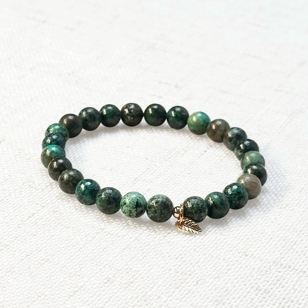 African turquoise bracelet with golden leaf charm – 6mm beads