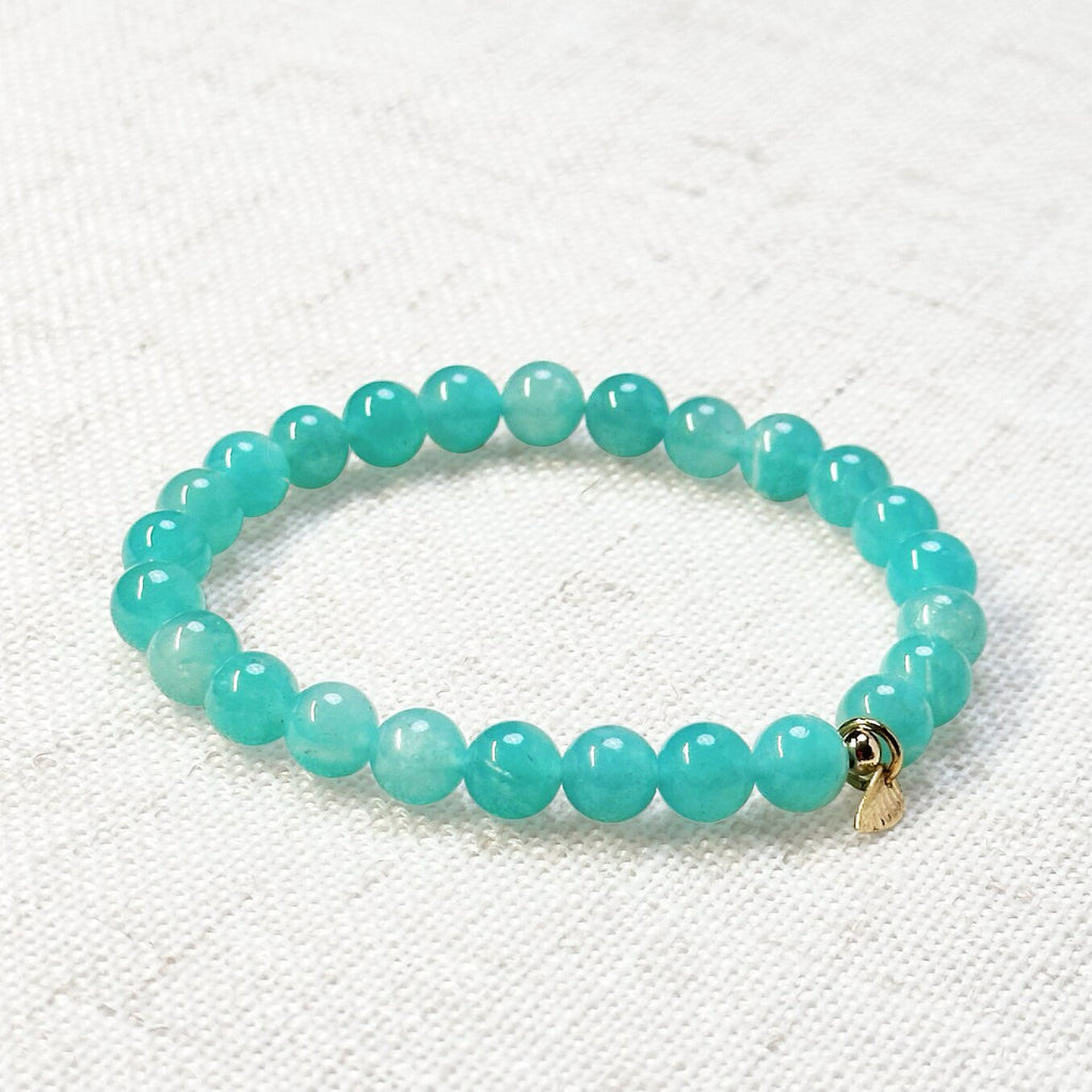 Natural Amazonite bracelet with soothing turquoise-green beads and golden leaf charm