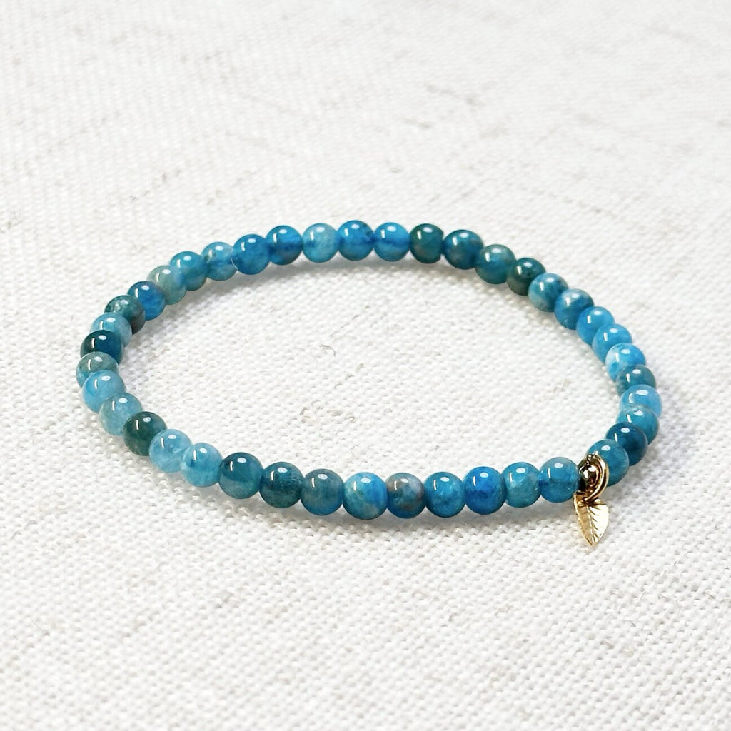 Blue Apatite bracelet with natural crystal beads and golden leaf charm