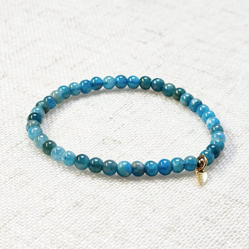 Blue Apatite bracelet with natural crystal beads and golden leaf charm