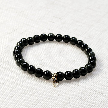 Black obsidian bracelet with 6mm beads and golden leaf charm for protection and grounding