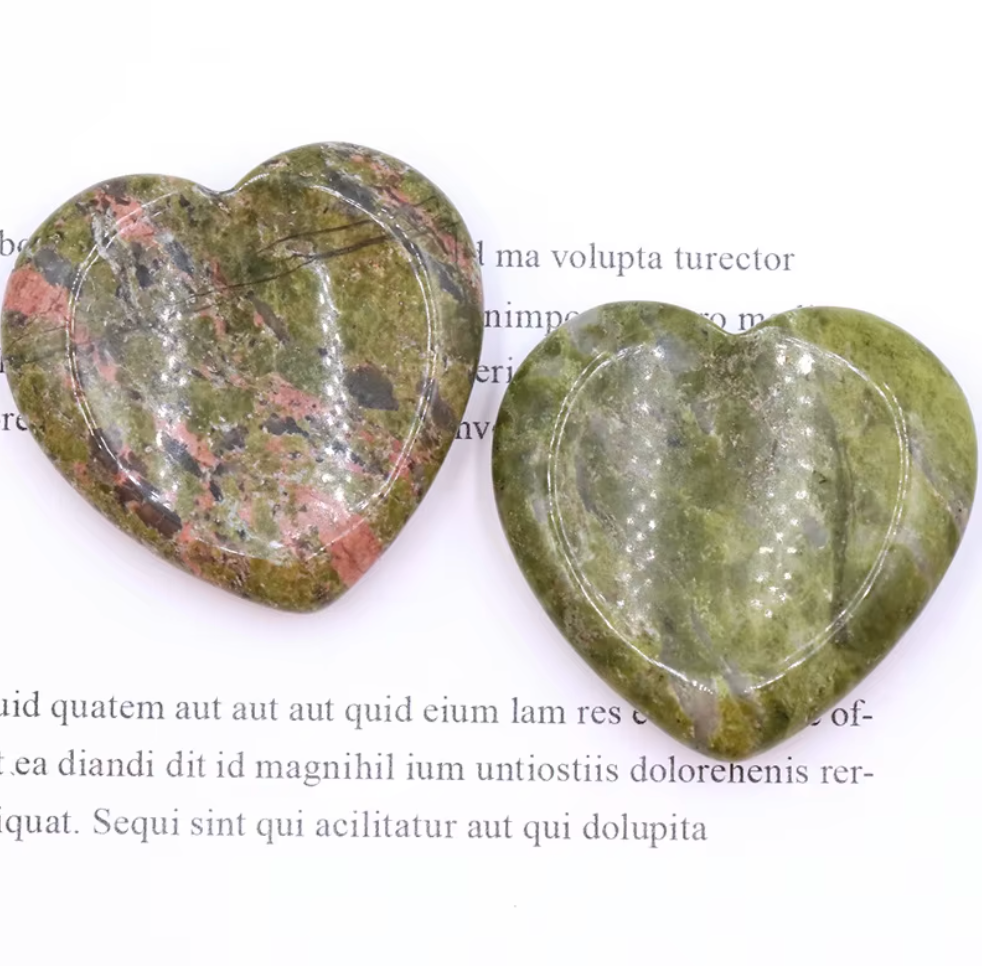 Polished Chlorite crystal worry stone in a heart shape, promoting balance, renewal, and relaxation.