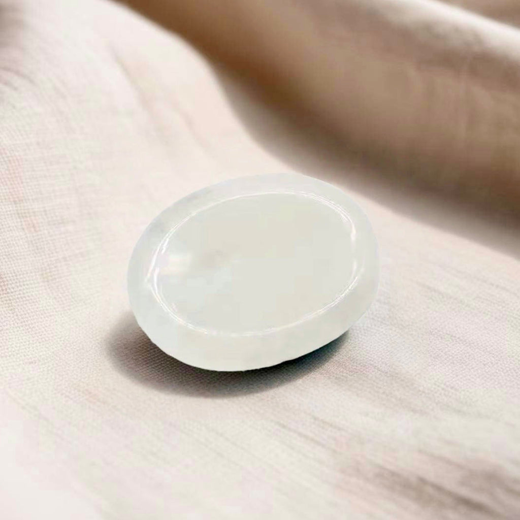 Beautifully crafted Clear Quartz thumb worry stone, perfect for enhancing intuition, clearing negativity, and restoring inner peace.