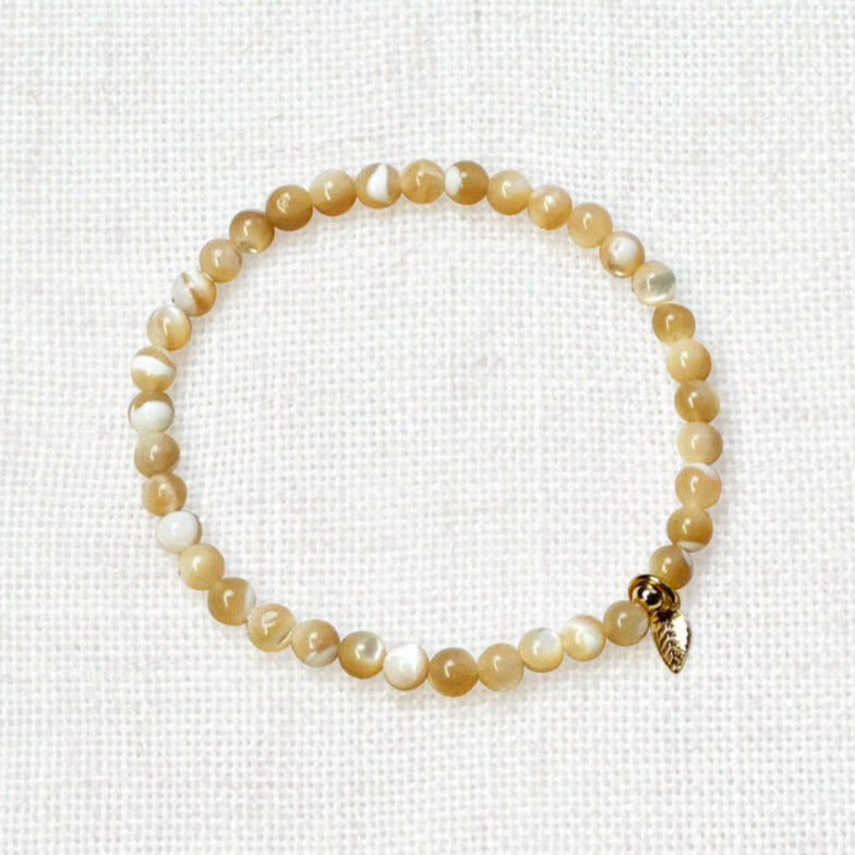 Boho-style Driftwood Shell energy bracelet made from sustainable materials