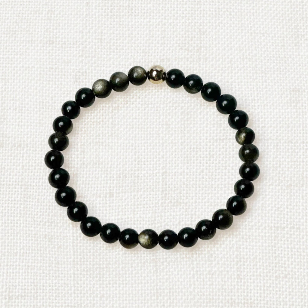 Golden obsidian bracelet with 6mm beads and golden charm for strength and clarity