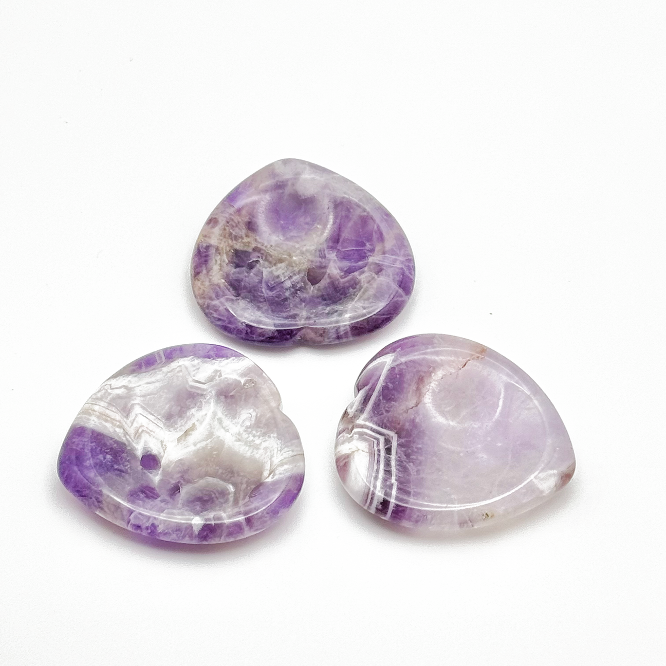 Heart-shaped Amethyst worry stone for stress relief, intuition, and emotional healing.