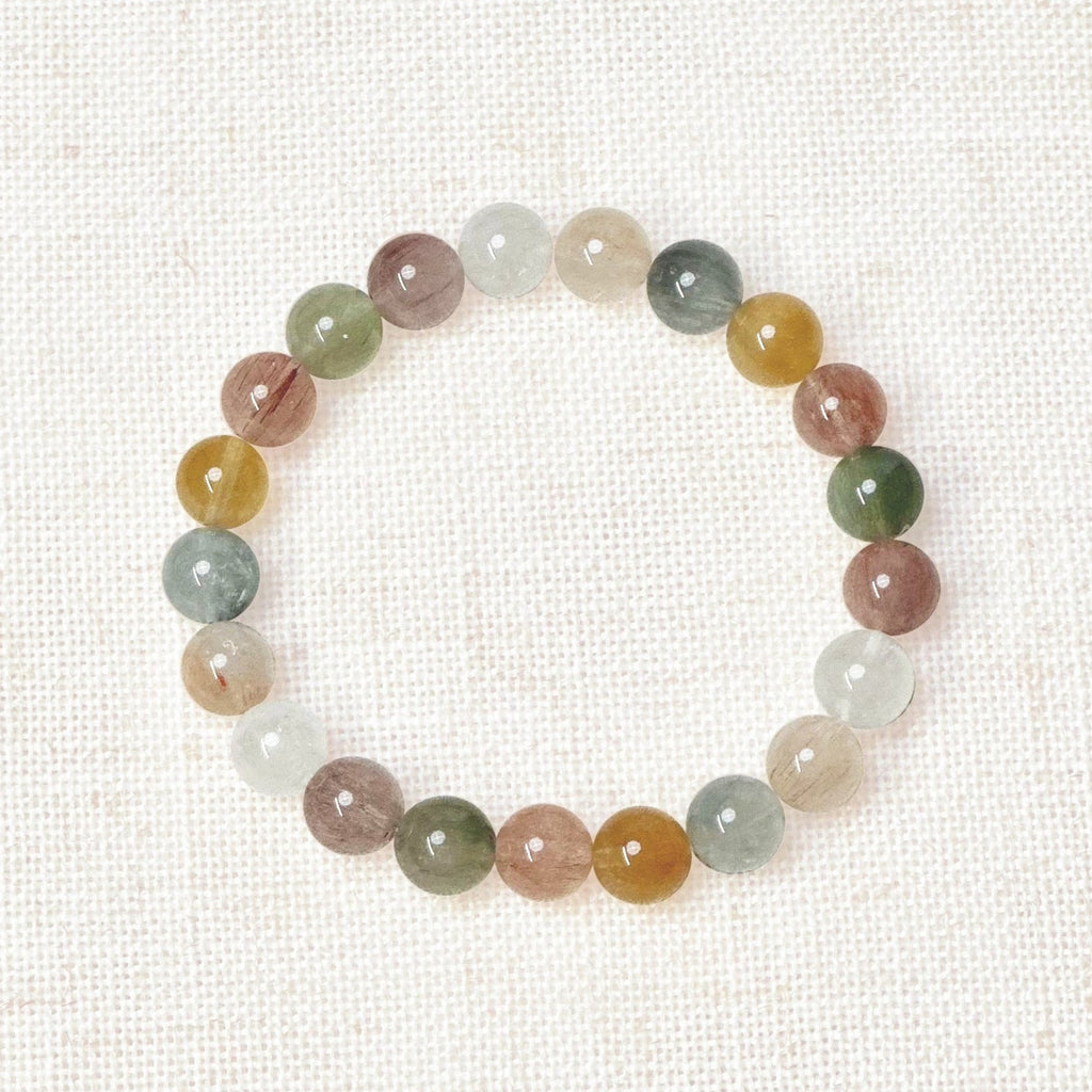 High-Quality Rutilated Quartz Energy Crystal Bracelet: A stunning bracelet featuring premium rutilated quartz beads with golden needle-like inclusions. Known for amplifying energy, clarity, and spiritual growth.