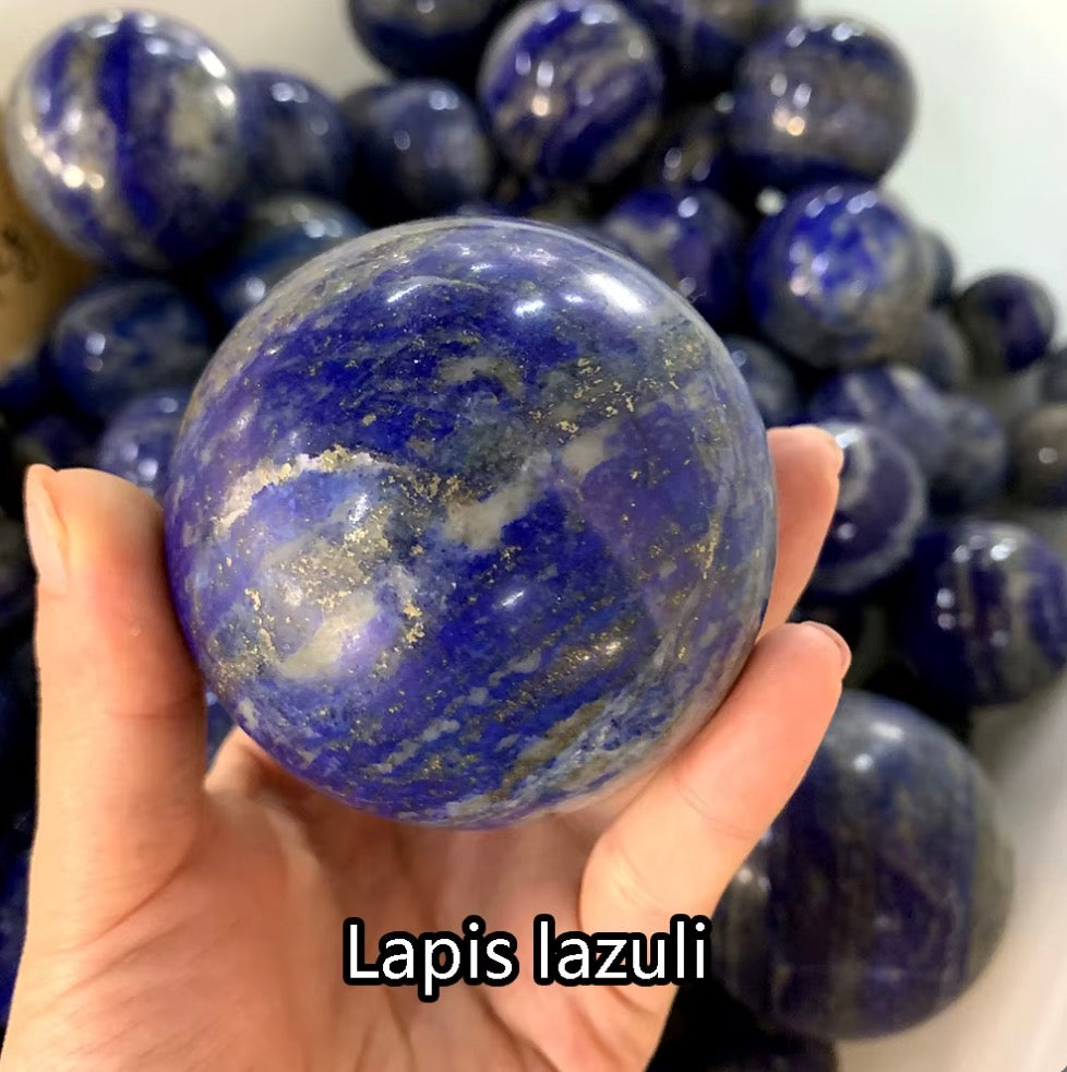 “Lapis Lazuli Crystal Sphere promoting wisdom, truth, and clarity, ideal for home decoration.”