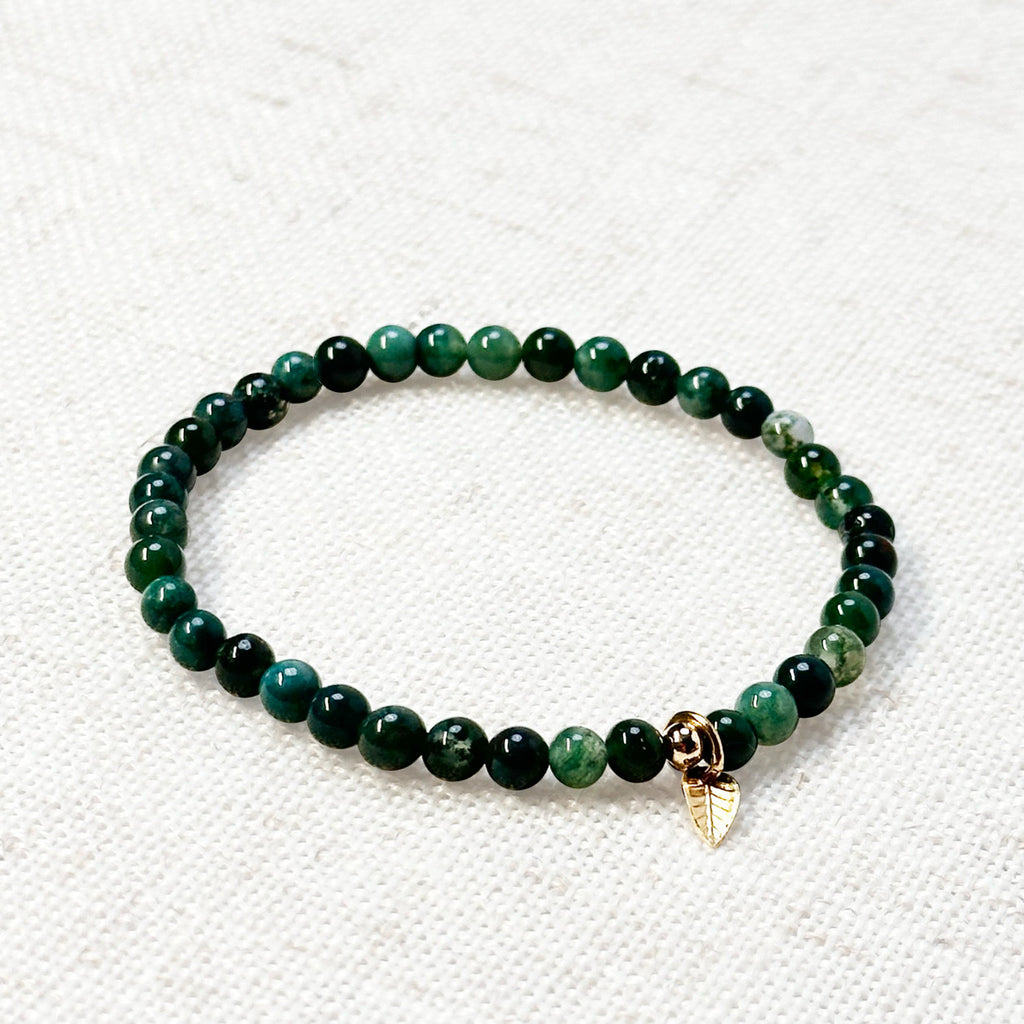 Crystal bracelet made with moss agate beads and gold detail for mindful wear