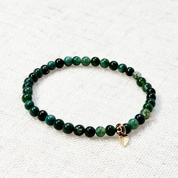 Crystal bracelet made with moss agate beads and gold detail for mindful wear