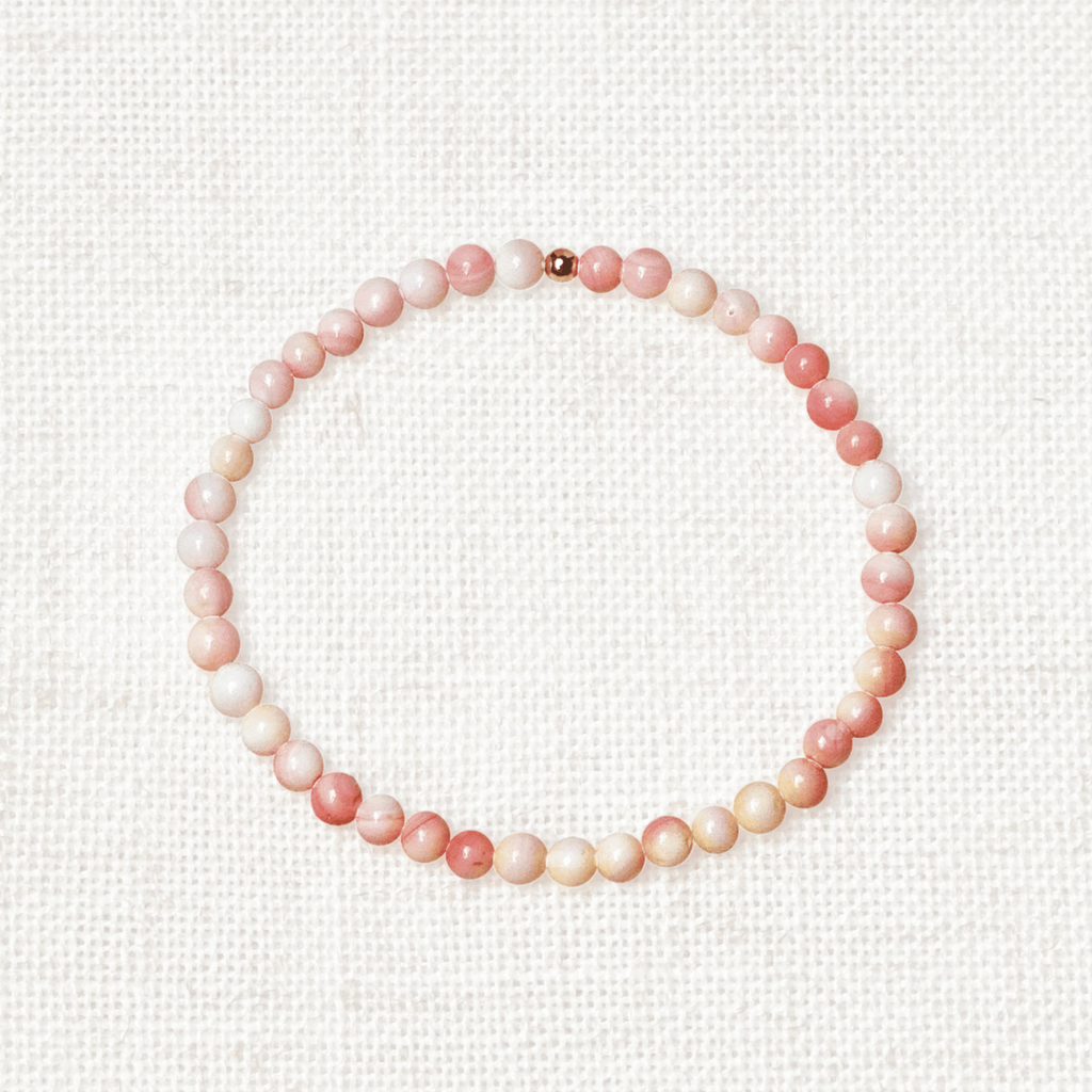Pink shell bracelet with 4mm beads and golden charm for calm and feminine energy