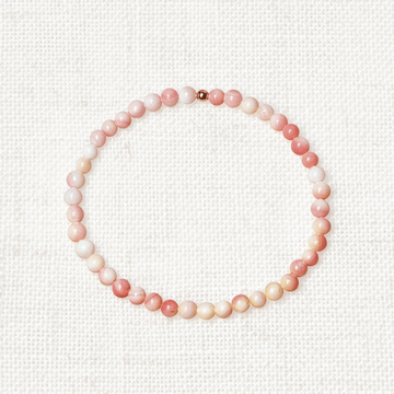 Pink shell bracelet with 4mm beads and golden charm for calm and feminine energy