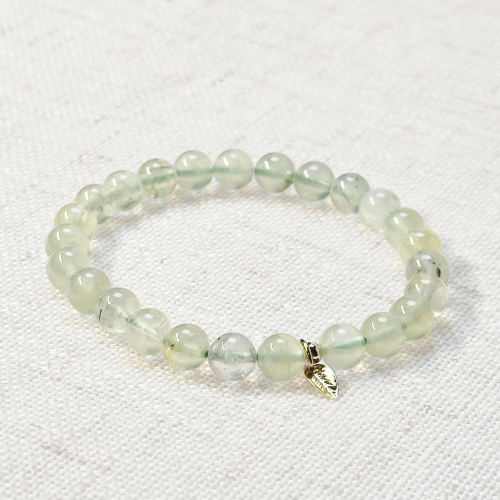 Prehnite bracelet with 6mm beads and golden leaf charm for calm and clarity