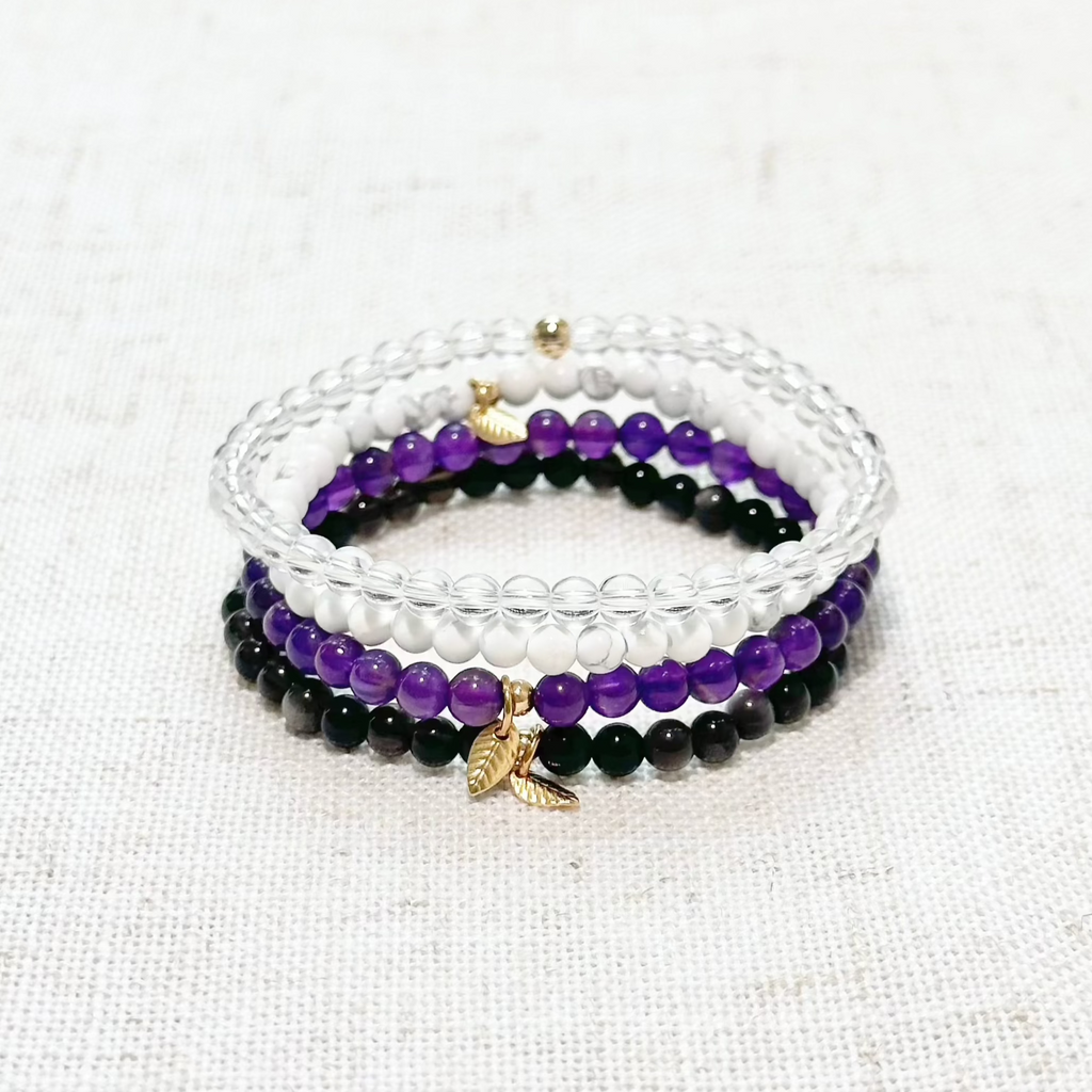 Protection & Grounding bracelet set with Amethyst, Clear Quartz, Silver Obsidian, and Howlite beads.