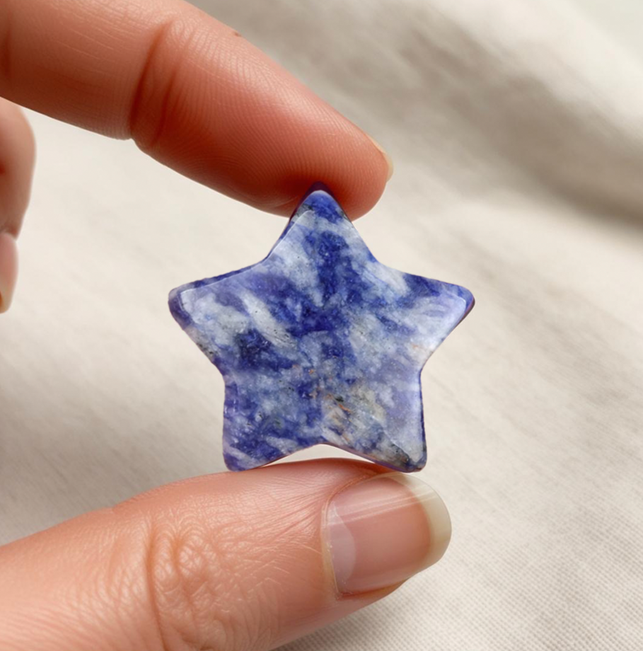 Star-shaped Sodalite worry stone for stress relief, mental clarity, and emotional balance.