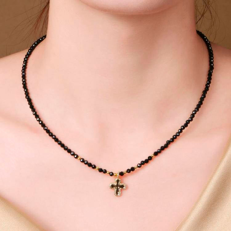 Stunning Spinel crystal necklace with cross in necklace design, perfect for blocking negative energy.
