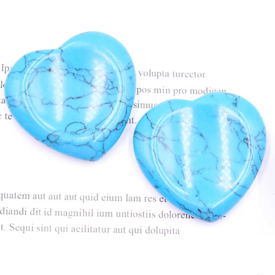 Polished Turquoise crystal worry stone in a heart shape, promoting protection, confidence, and relaxation