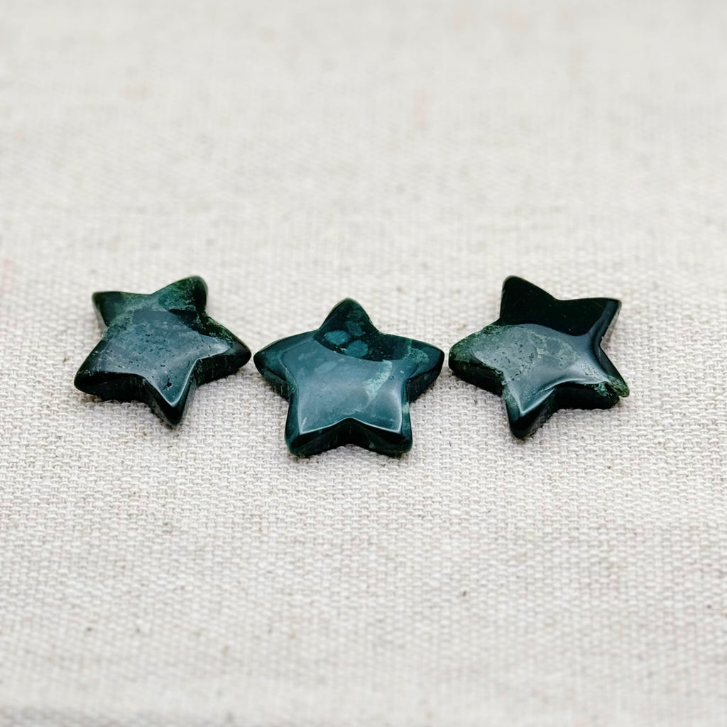 Mini star-shaped Water Moss Agate worry stone for balance, emotional healing, and grounding energy.