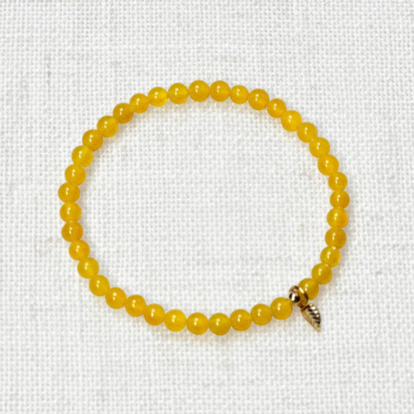 Yellow carneol bracelet styled with sun-kissed tones