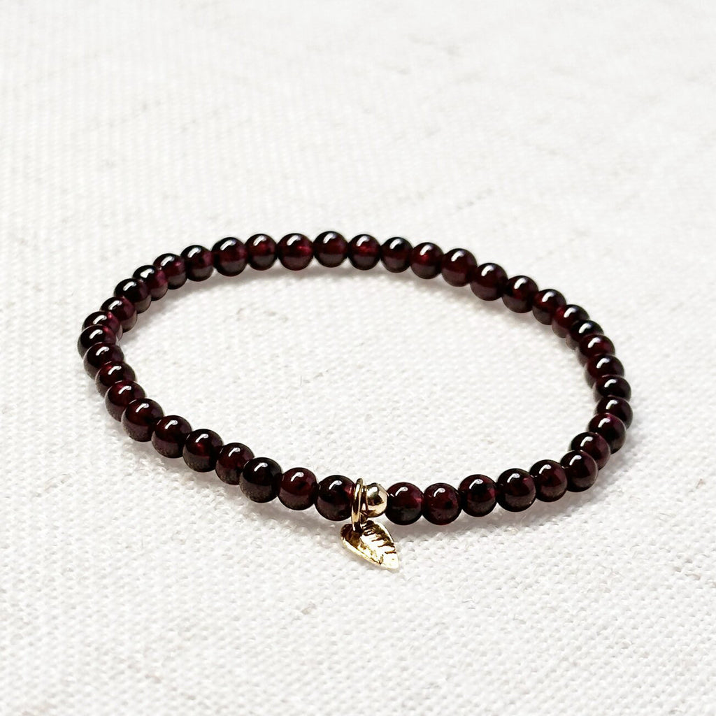 Garnet bracelet styled for energy, passion, and emotional grounding.