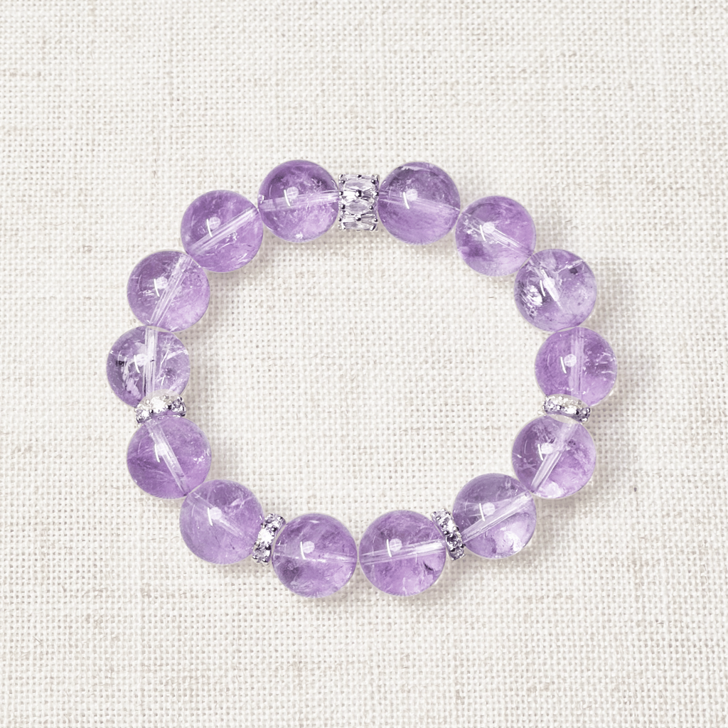 Elegant lavender amethyst bracelet featuring high-quality, translucent purple gemstones with a delicate and soothing hue. Designed for tranquility, balance, and inner peace, this handcrafted piece adds a touch of sophistication and serenity to any outfit.”